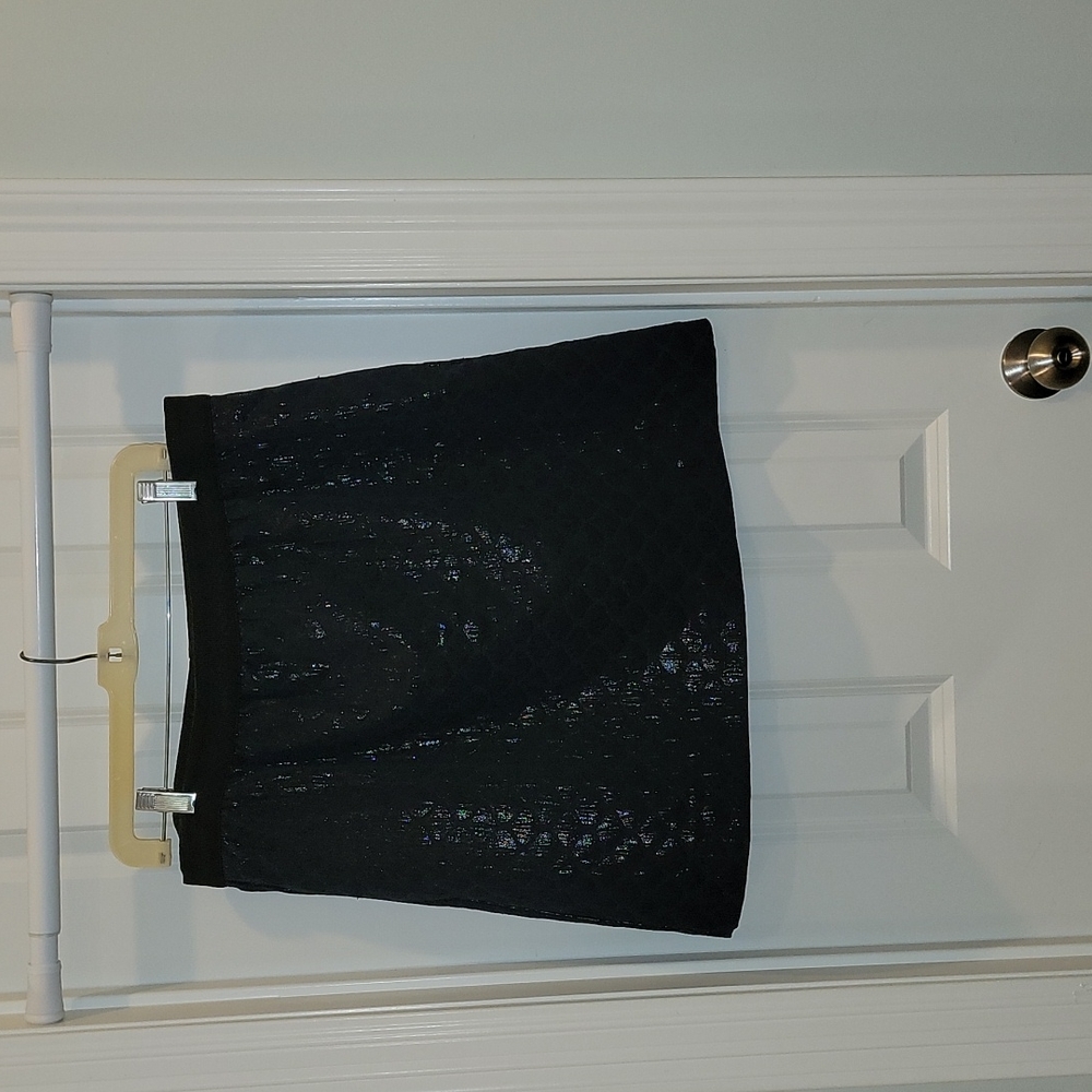 Navy shiny skirt with black waist detail from Ann Taylor Loft. Sizev14.